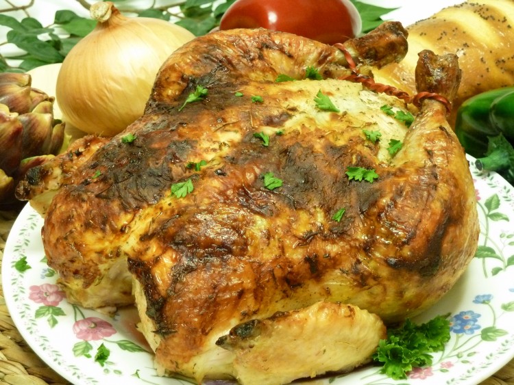 Herbed yogurt under the skin ensures a deliciously moist roast chicken. Ranch herb roast chicken.