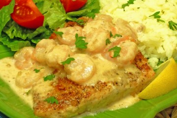 Delicious shrimp scampi sauce tops red snapper.