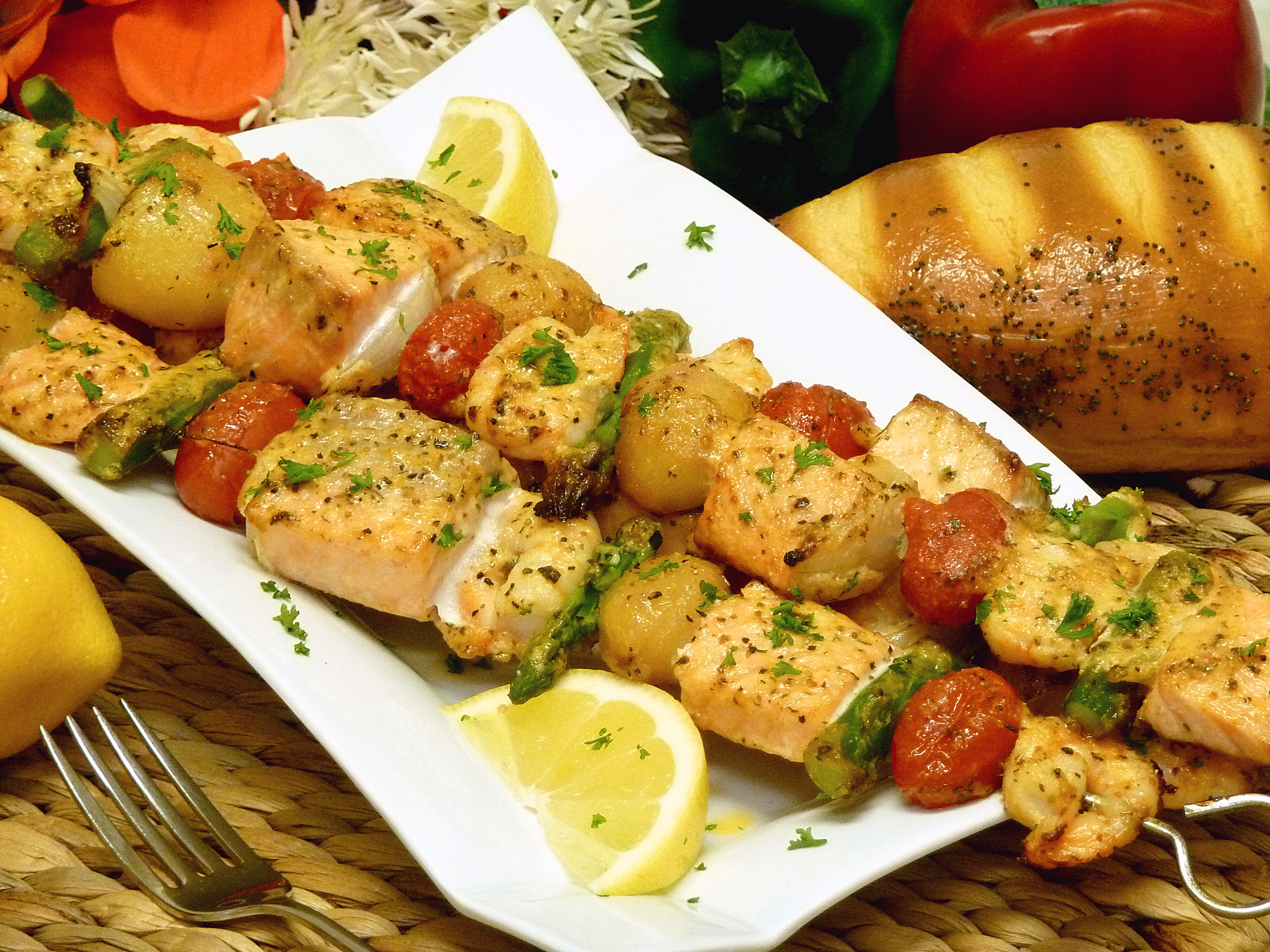 A delightfully different basting sauce makes salmon kebabs extra-special.