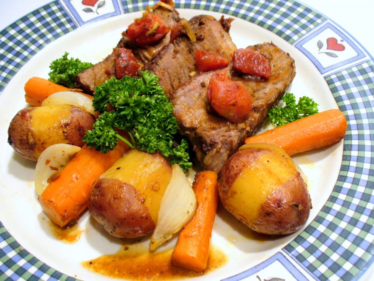 Enjoy smothered pot roast with vegetables just like Grandma used to make.