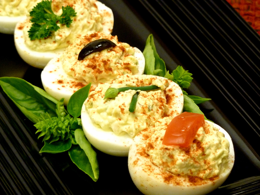 Chicken is the secret ingredient to liven up traditional deviled eggs. Look how pretty they are!