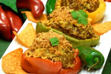 Loco Taco Stuffed Peppers are stuffed with beef, sausage, rice, nacho chips, and all of your favorite Mexican flavors.