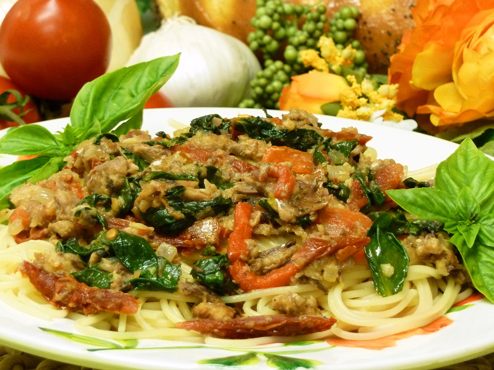Mediterranean pasta incorporates healthy regional ingredients into a colorful, satisfying dish.