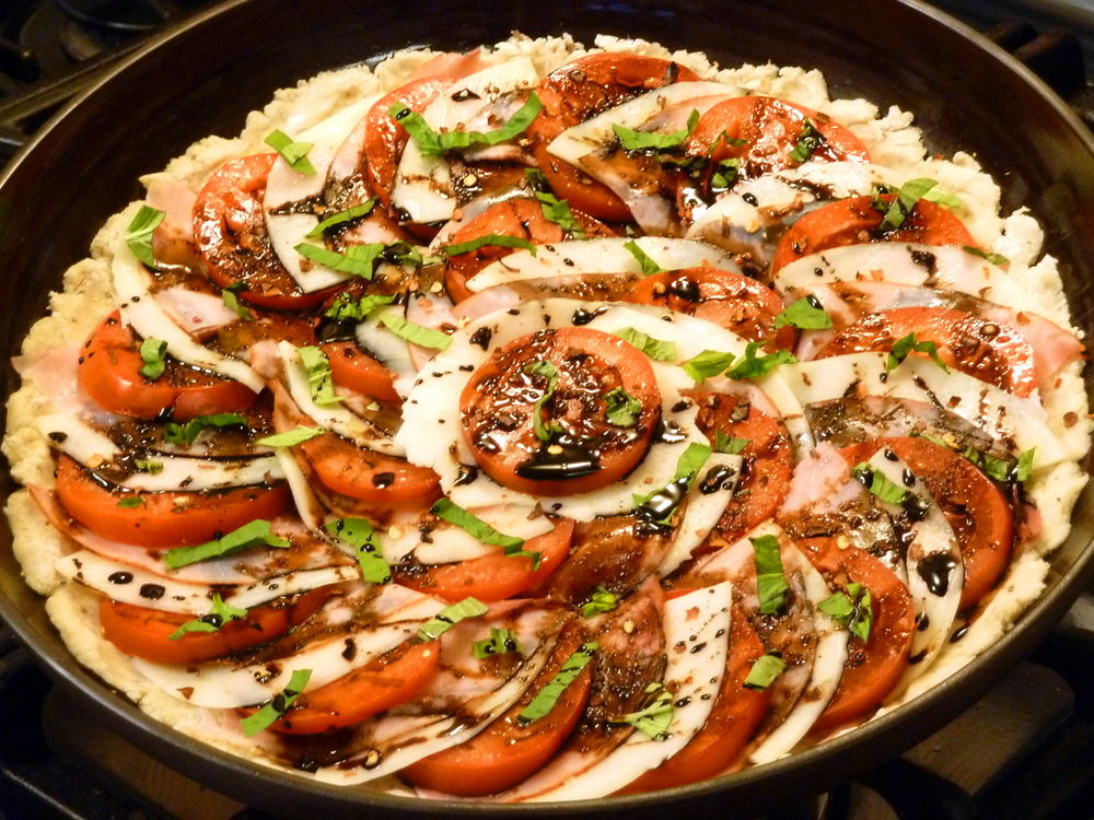 Colorful skillet flatbread boasts a yeast-less crunchy crust topped with favorite pizza toppings.