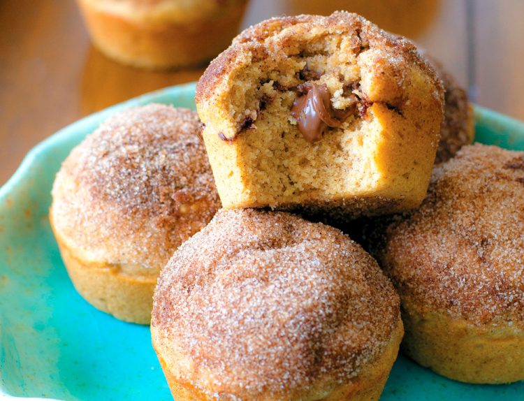 Nutella Cinnamon Sugar Muffins are baked doughnut-like muffins stuffed with chocolate hazelnut spread and topped with buttery cinnamon sugar.