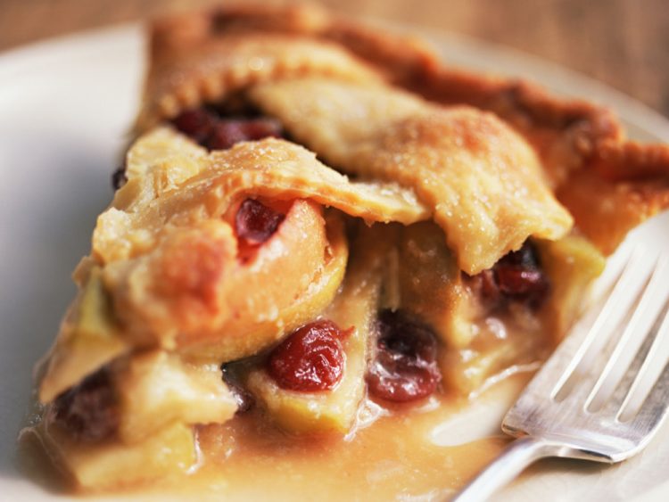 The mixture of tart cranberries with sweet raisins and apples make this yummy cranberry apple pie special.