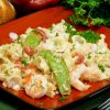 Creamy, cheesy shrimp pasta casserole is packed with flavor and gets crunch from sweet snow peas.