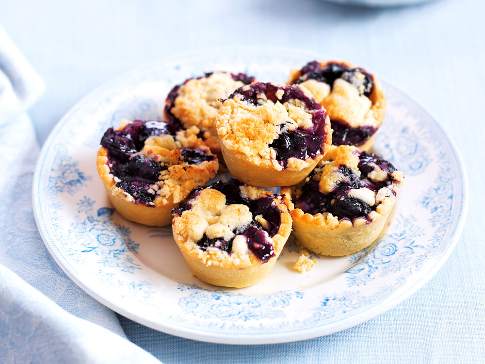 Scrumptious miniature blueberry tarts are a snap to make with few ingredients.