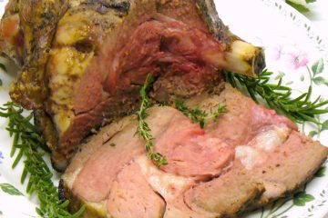 Herb Leg of Lamb Recipe: Whole leg of lamb is marinated with fresh herbs and spices, then roasted to tender perfection.