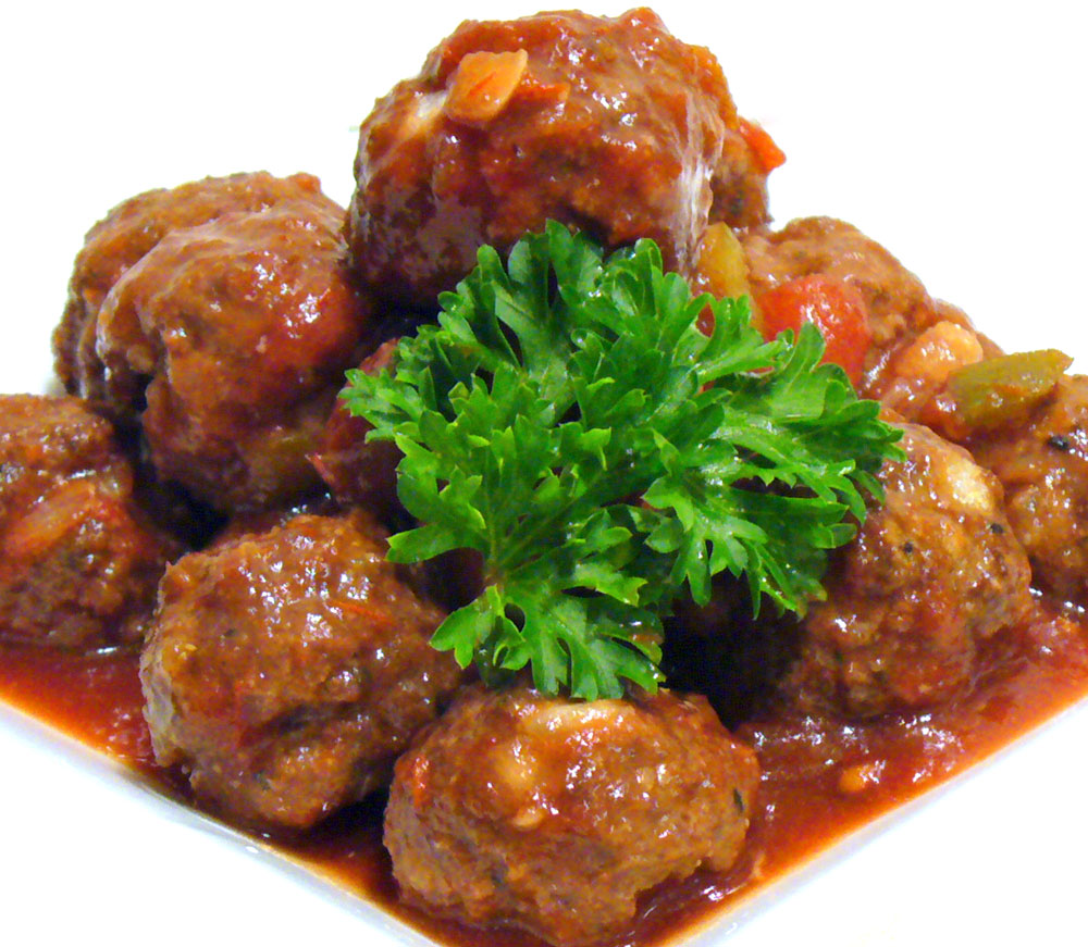Sweet Spicy Cocktail Meatballs are bathed in an addictive 2-ingredient sauce that is a snap to make.