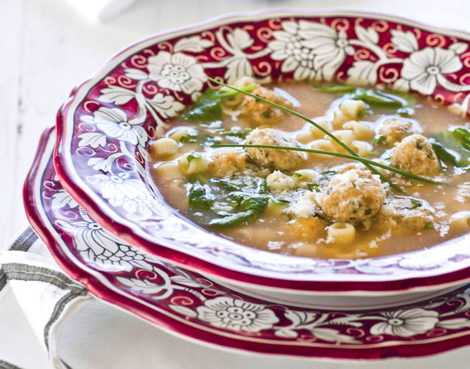 Yummy Italian Wedding Soup gets kicked up a notch with the addition of Italian Sausage and spinach.