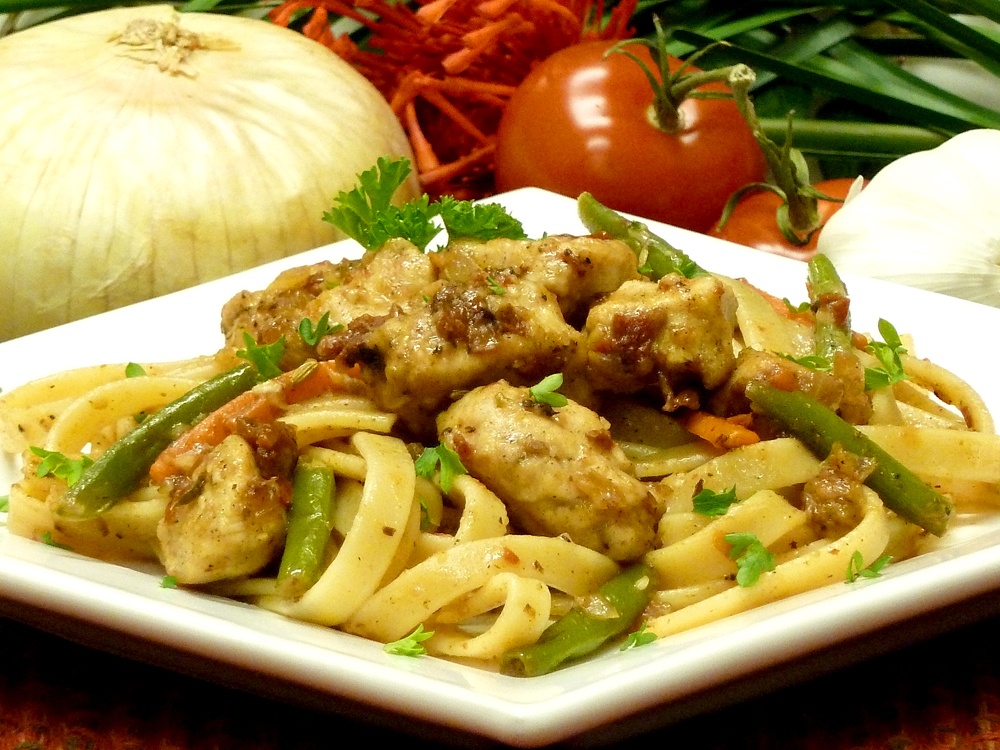 Chicken Sun-Dried Tomato Pasta with vegetables in a delicious wine sauce.