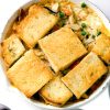 Skillet Chicken Mushroom Potpie is a yummy upscale version of the classic with shiitake mushrooms and crunchy bread topping.