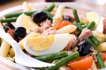 Colorful and tasty Pasta Nicoise Salad is loaded with chicken and vegetables.