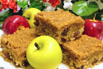 Apple Raisin Bars are lightly-spiced bars delightfully moist. Streusel topping means no frosting necessary. Yum!