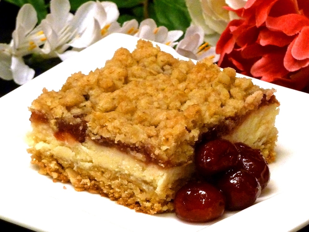 Cranberry Cheesecake Bars are the perfect dessert for a crowd. Good year-round and delicious at room temperature.