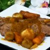 Easy beef brisket is made in a cooking bag with vegetables and an amazing natural gravy.