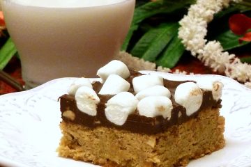 Peanut Butter Cookie Bars are topped with peanut butter chocolate and marshmallows. Easy to make.